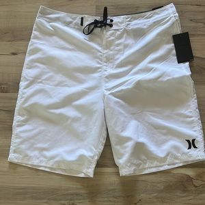 Hurley - Brand new, pure white board shorts with tags, size 34